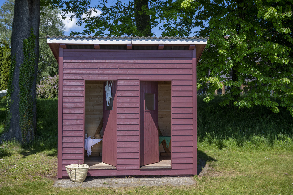 Historic bathhouse in the garden at Seegut Zeppelin near Lake Constance