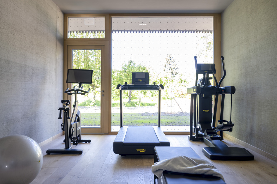 Fitness room with Technogym equipment at Seegut Zeppelin